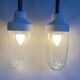 Pair of Art Deco wall lights in cast iron, glass and ceramic from the 1930s.