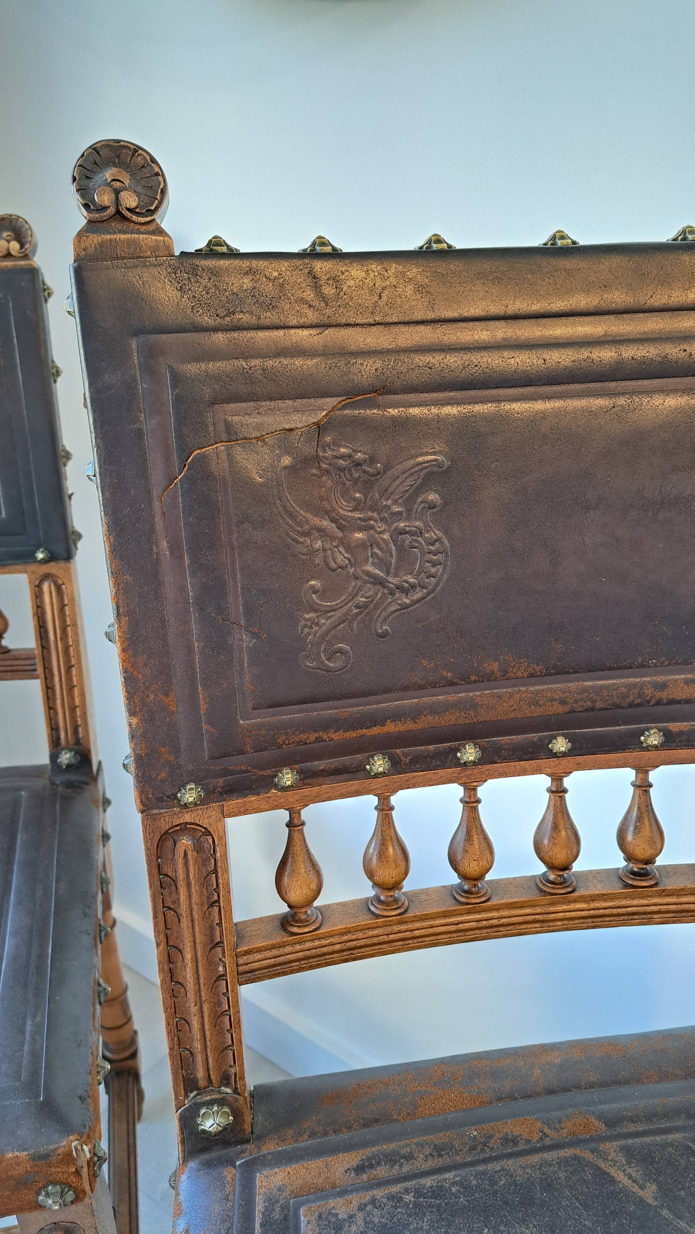 Pair of antique chairs in embossed leather, Henri II style.