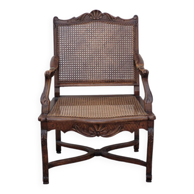 Fauteuil canné Louis XV Régence accoudoirs cuir décorées coquille