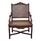 Louis XV Regency cane armchair leather armrests decorated with shell