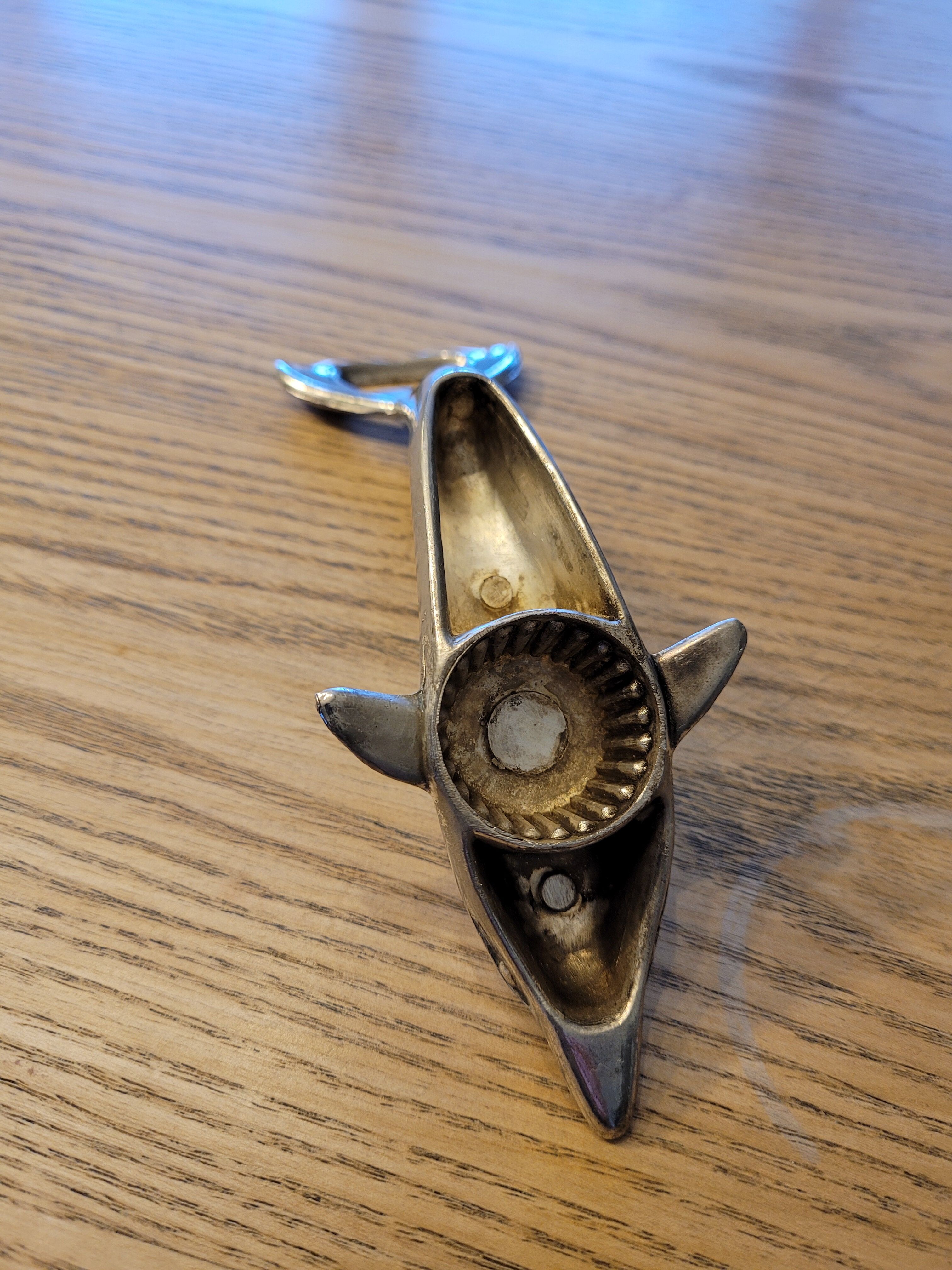 Silver dolphin bottle opener
