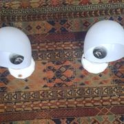 Pair of wall lights from the 1950s in porcelain.