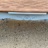 Louis XV style walnut table with a natural wood top.