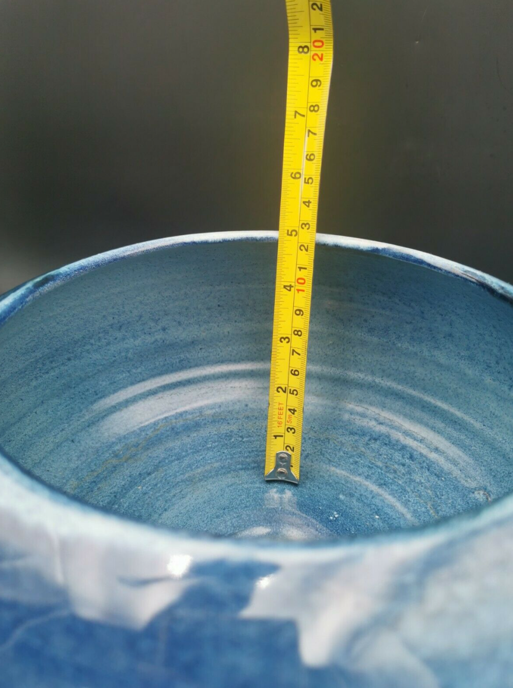 Blue ceramic bowl and its undercut