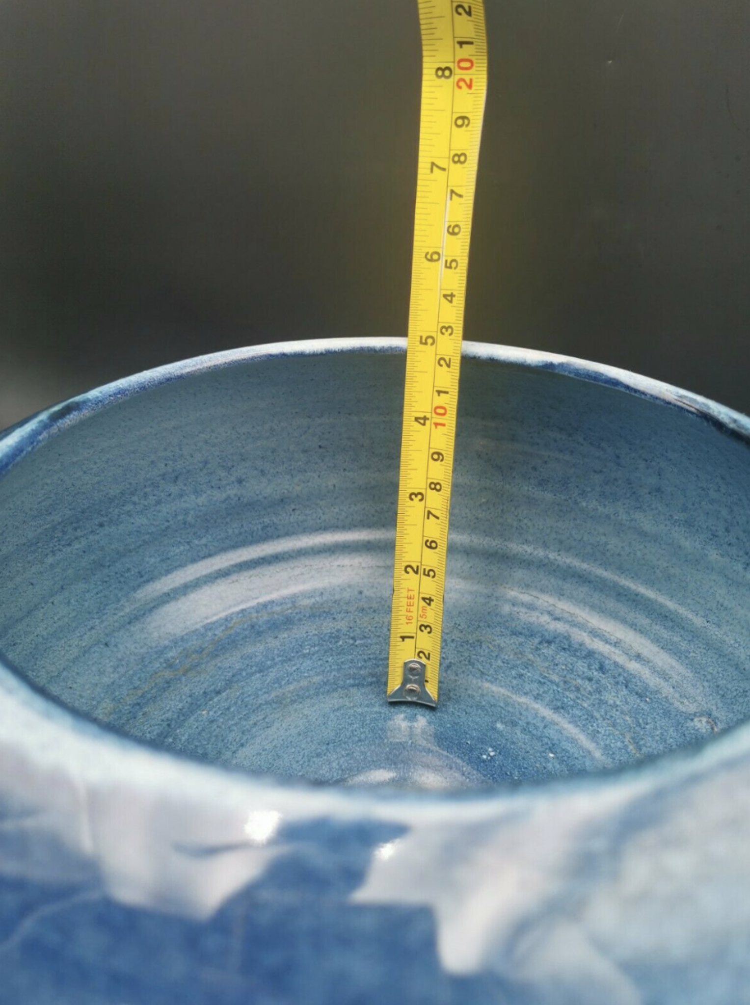 Blue ceramic bowl and its undercut