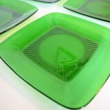 4 transparent green glass plates. Vintage 70s.