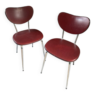 Pair of burgundy faux leather chairs