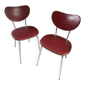 Pair of burgundy faux leather chairs