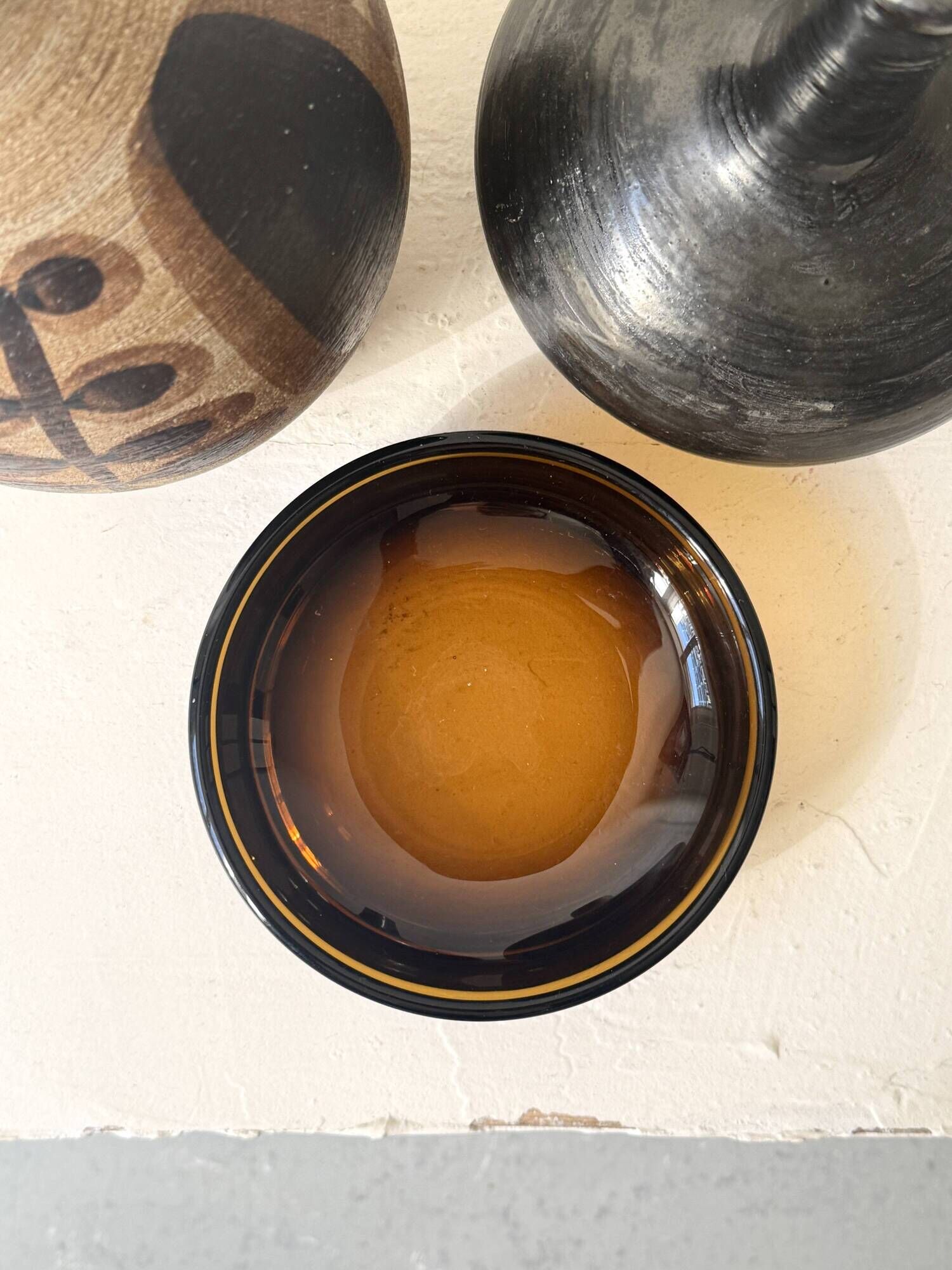 Smoked glass catchall fully tinted in amber.