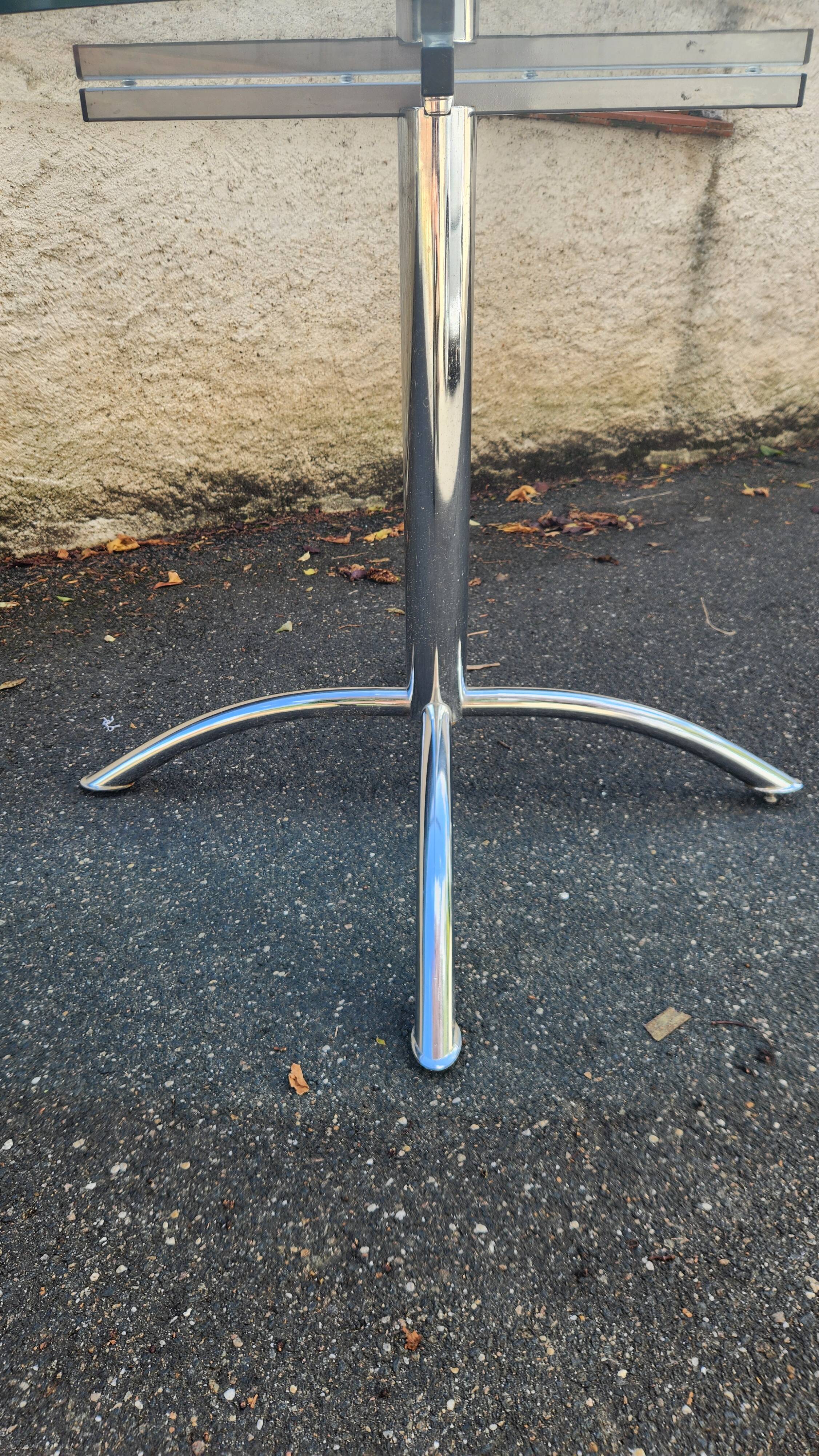 Chrome table with glass dining top from the 1980s.