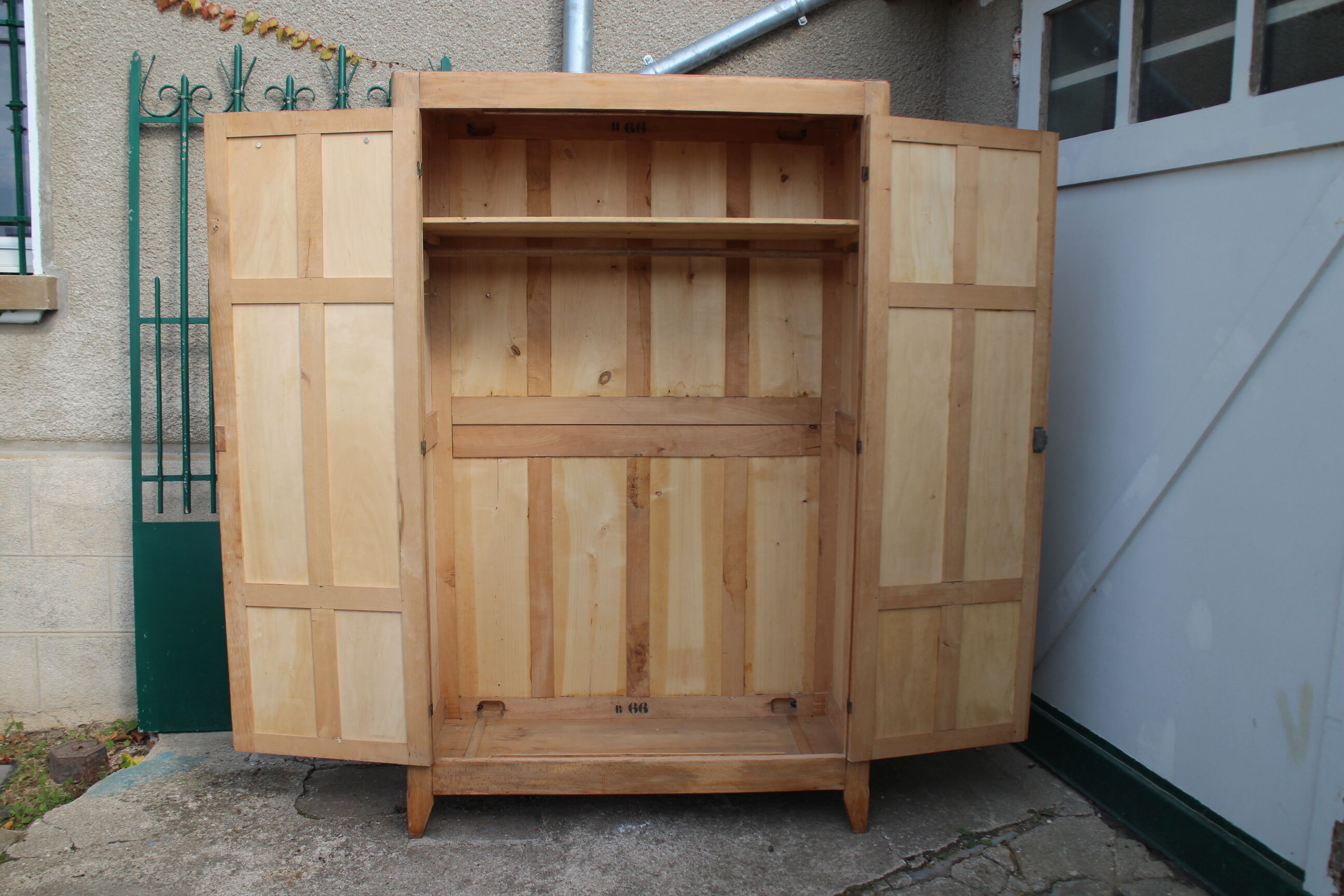 Parisian wardrobe in raw wood