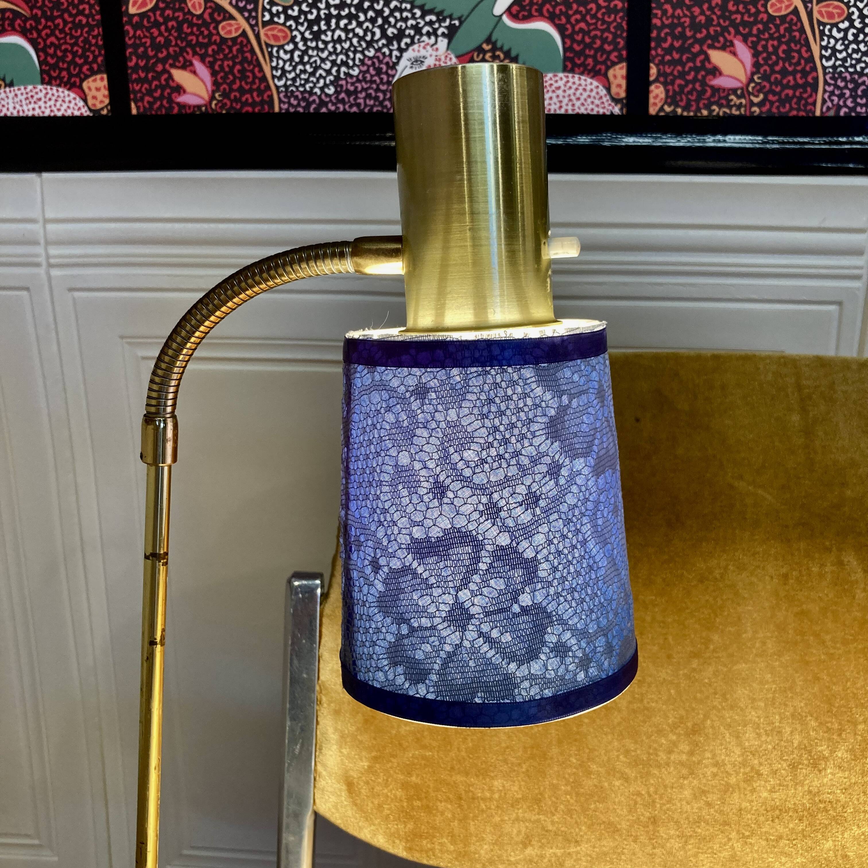 Pair of large modular industrial lamps from the 1950s.