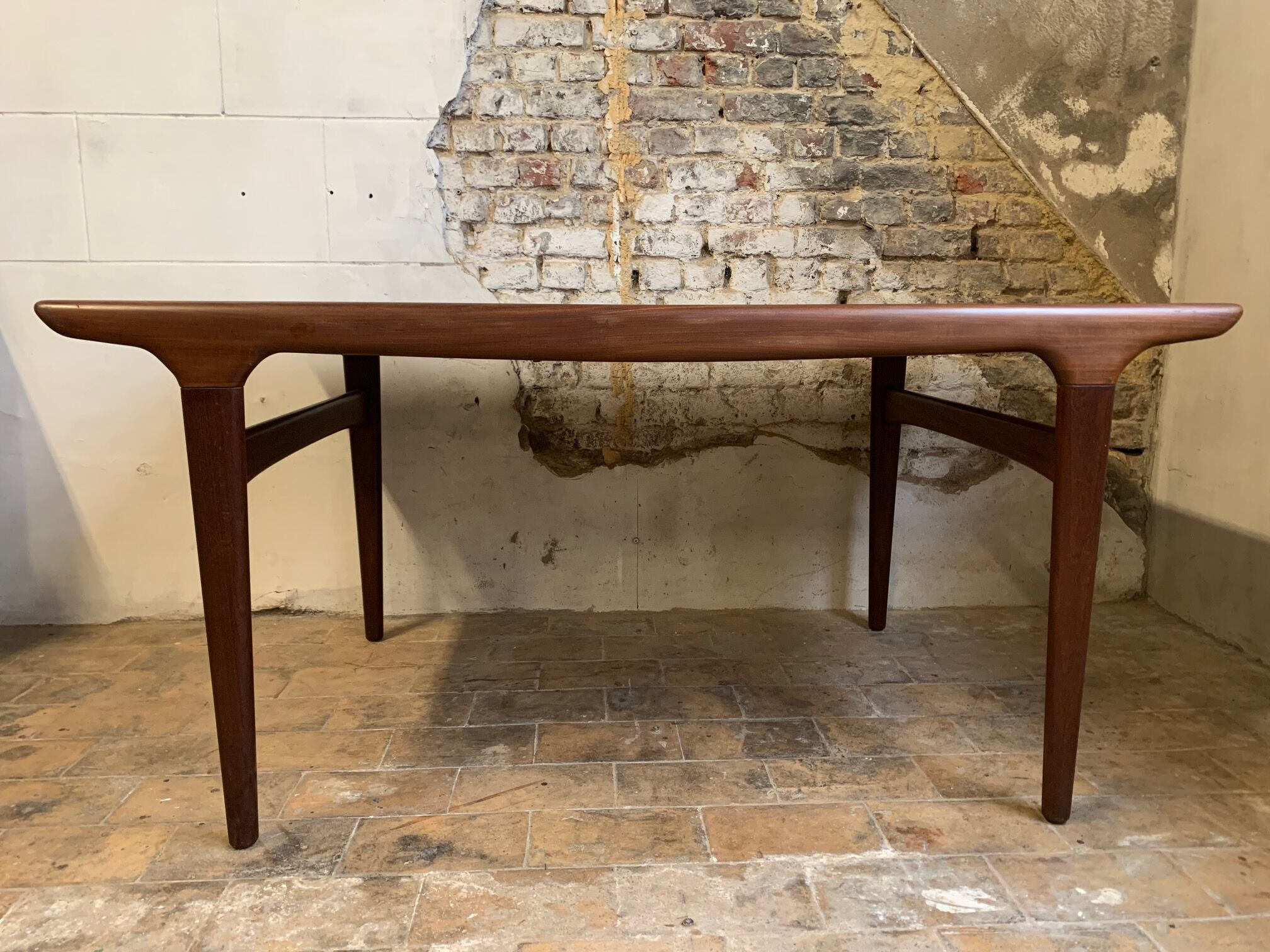 Dark teak dining table by Johannes Andersen for Uldum Møbelfabrik, Denmark