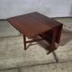 Table scandinave vintage en teck à rabats modulable années 60