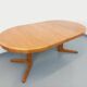 Vintage round dining table in Scandinavian style from the 60s and 70s in elm.