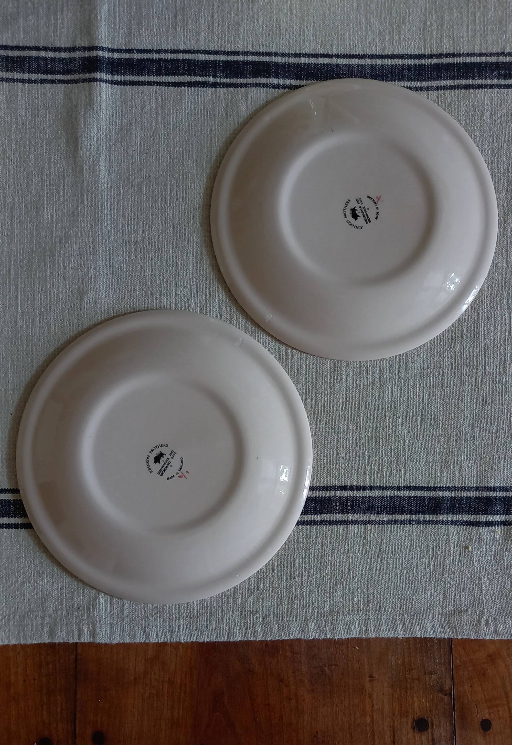 Pair of Johnson Brothers "Hearts & Flowers" dinner plates.