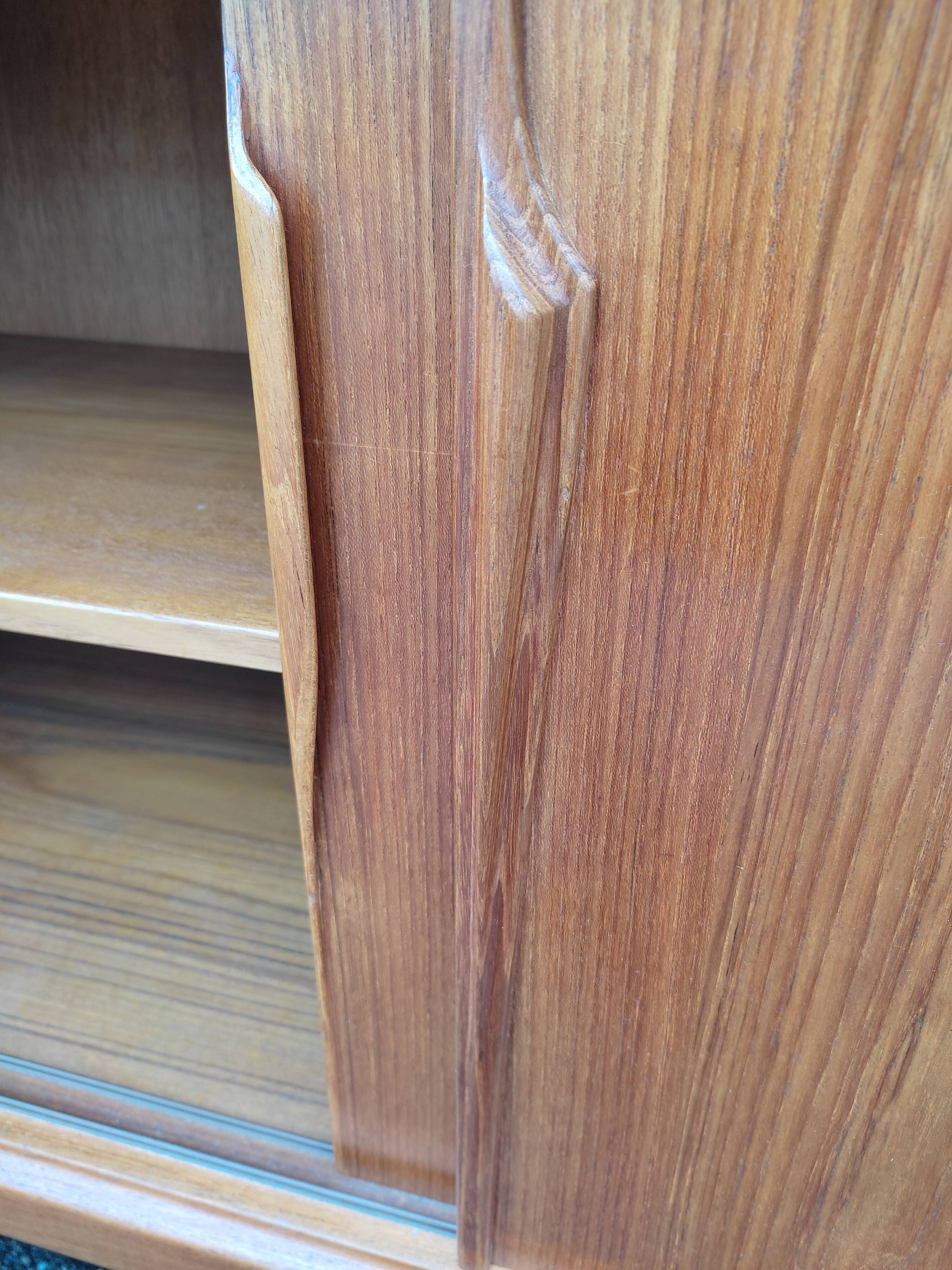 Scandinavian teak row by Axel Christensen for ACO Mobler