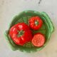 Vintage earthenware set – tomato salt and pepper shakers.