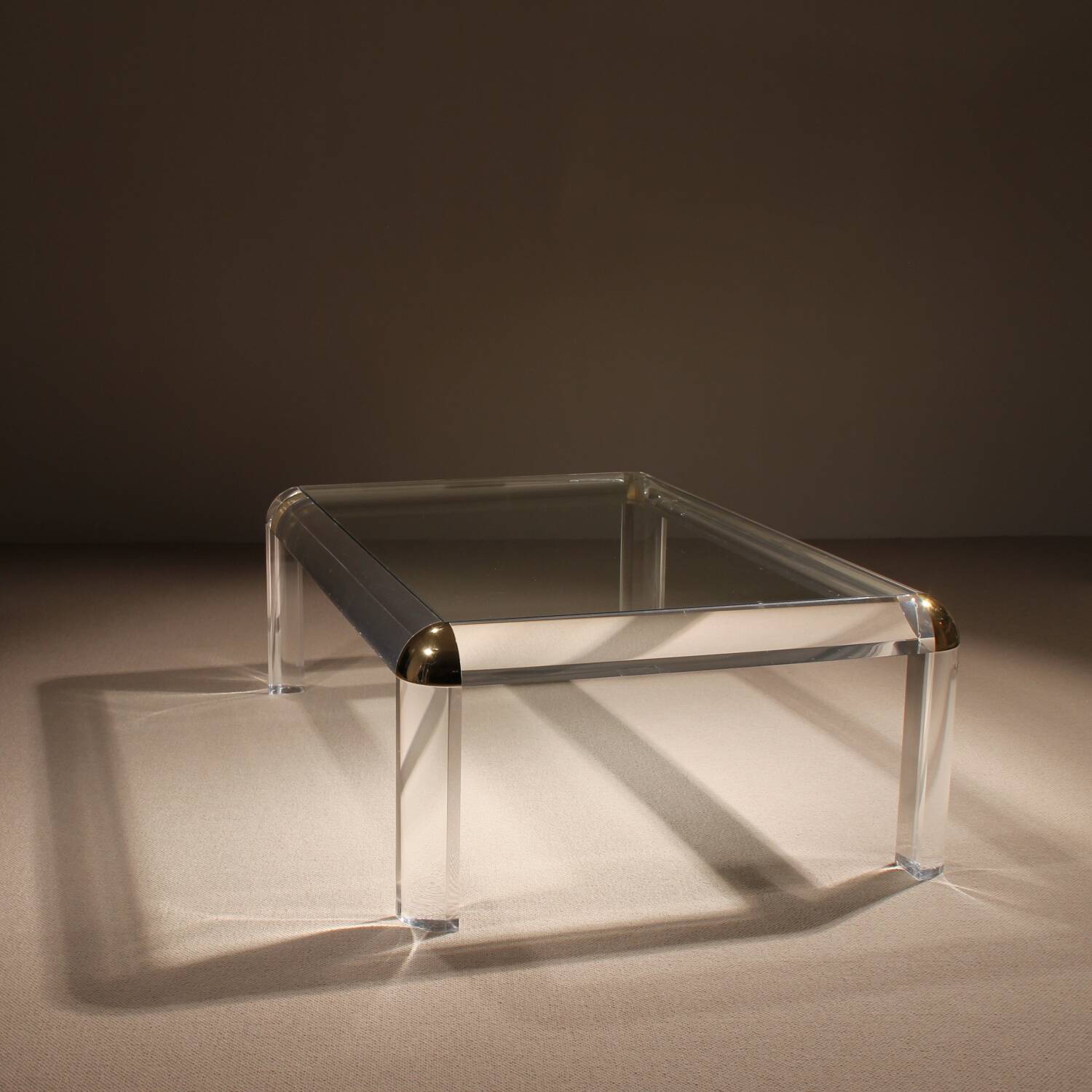 Rectangular Lucite & Brass Coffee Table | Europe 1970s