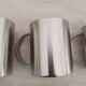 4 Grandes Tasses en inox et son support métallique