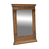 Small golden mirror in Louis XVI style.