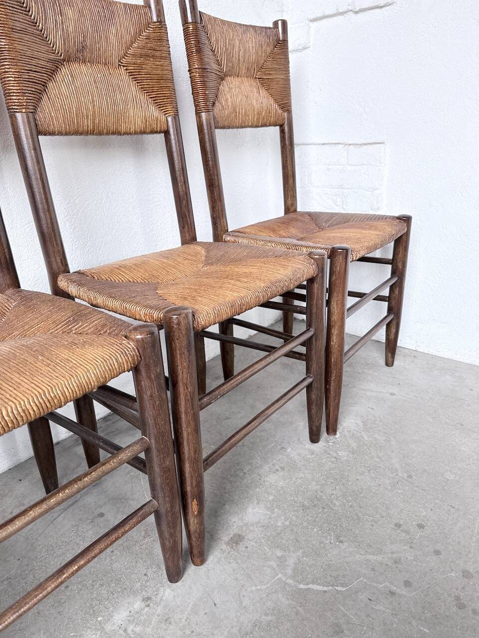 Set of 6 straw and oak Beauche chairs.