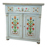 Antique low polychrome sideboard with floral decoration.