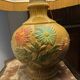 Ceramic table lamp with flower decor
