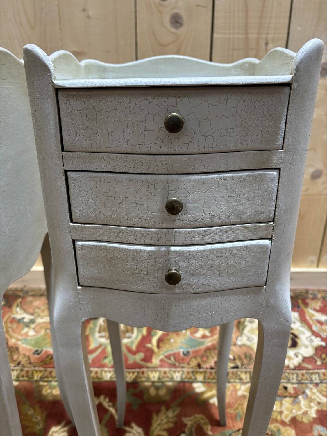 Pair of white Louis XV style bedside tables.