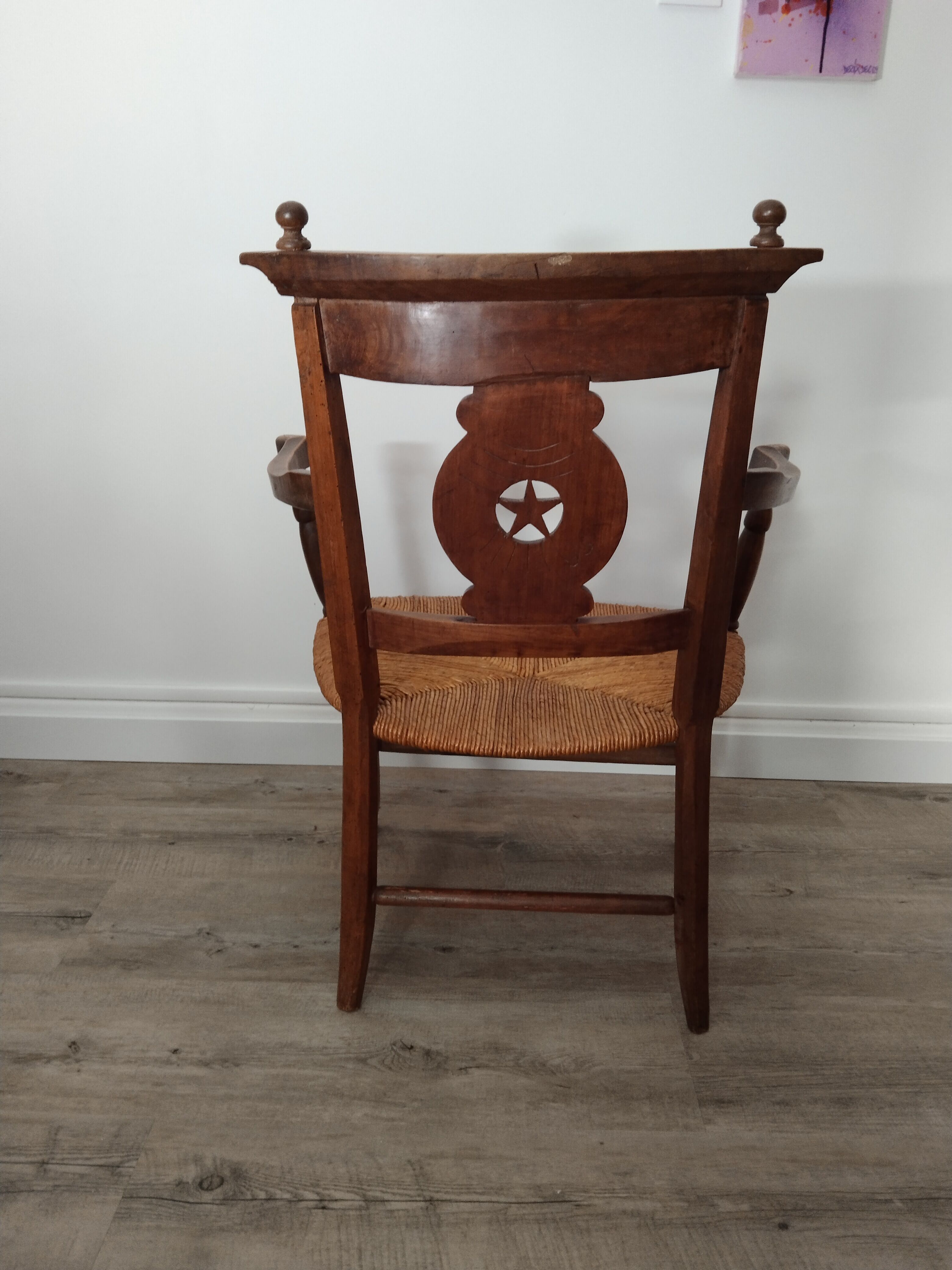 Straw armchair folk art.