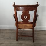 Straw armchair folk art.