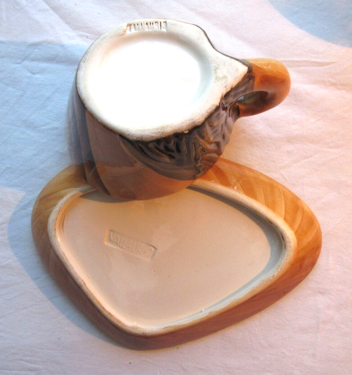 2 lunches decorated in faux wood style, cups + saucers, signed VALLAURIS