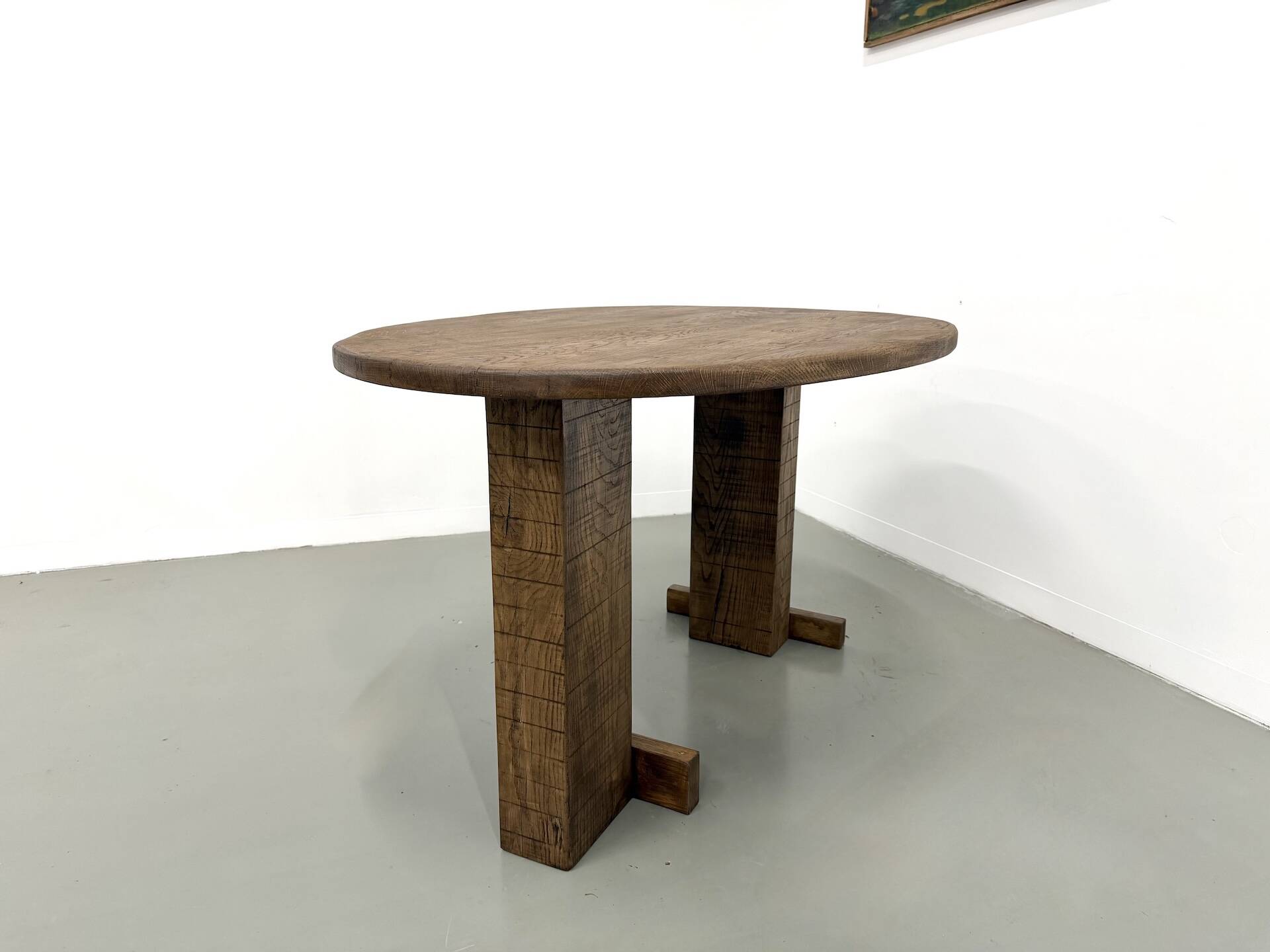 Oval table with T-shaped legs, solid oak, student woodworking project.