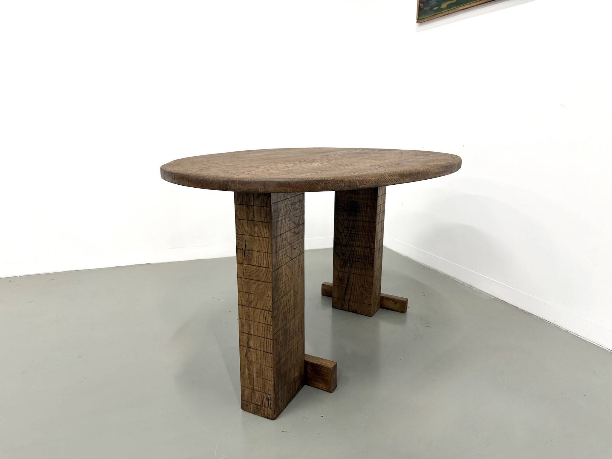 Oval table with T-shaped legs, solid oak, student woodworking project.