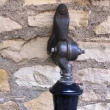 Antique cast iron and enamel wall lamp from the 1930s