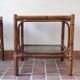 Pair of bamboo and rattan bedside tables, smoked glass tops.