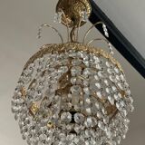Cascade chandelier with crystal and brass tassels