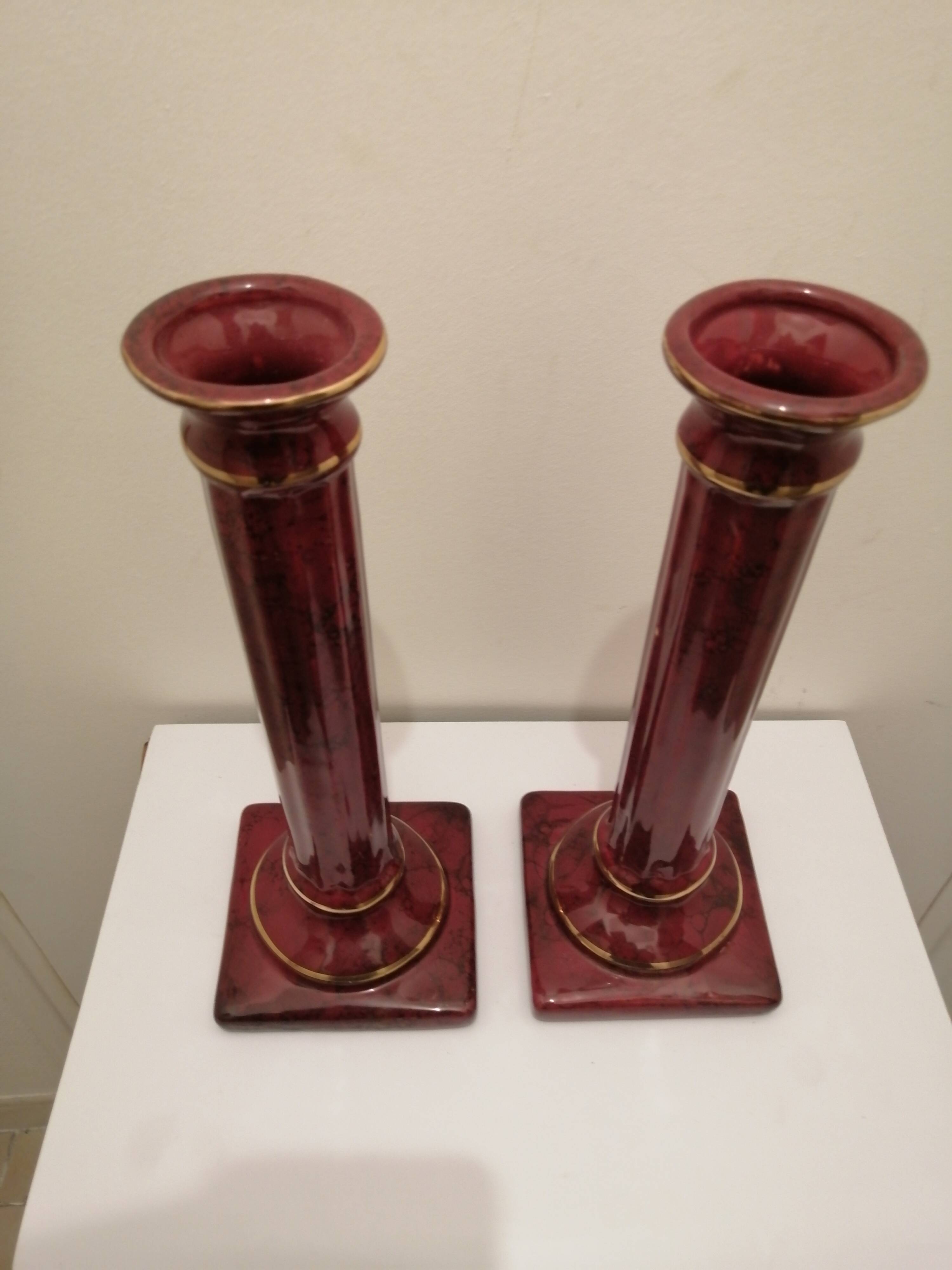 PAIR OF CERAMIC TORCHES