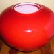 Pot-bellied, art deco vase in speckled ruby red multi-layered glass, white interior