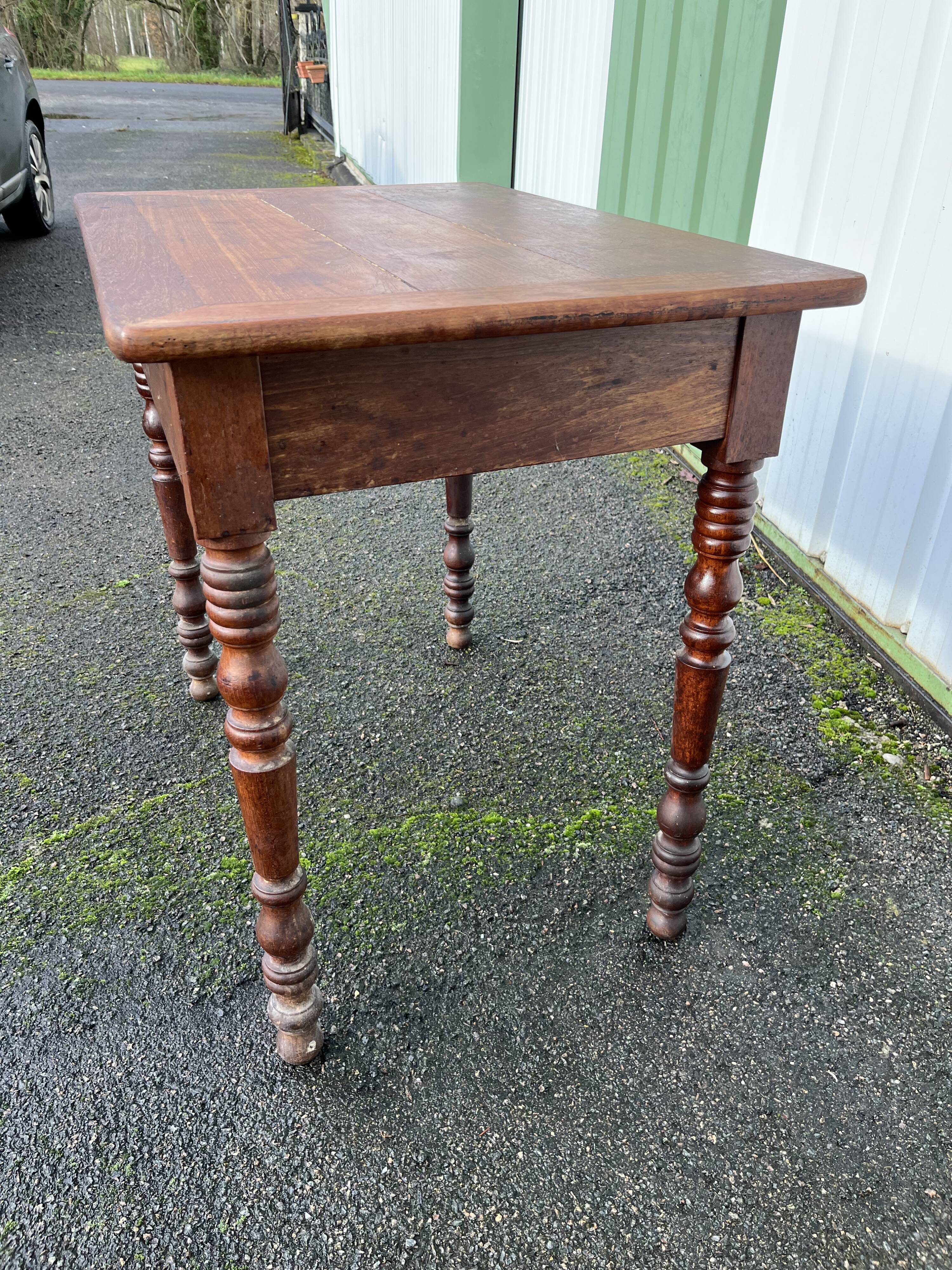 Wooden side table with turned legs