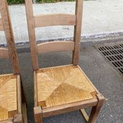 8 wooden dining chairs with straw seats, farmhouse style, high back.
