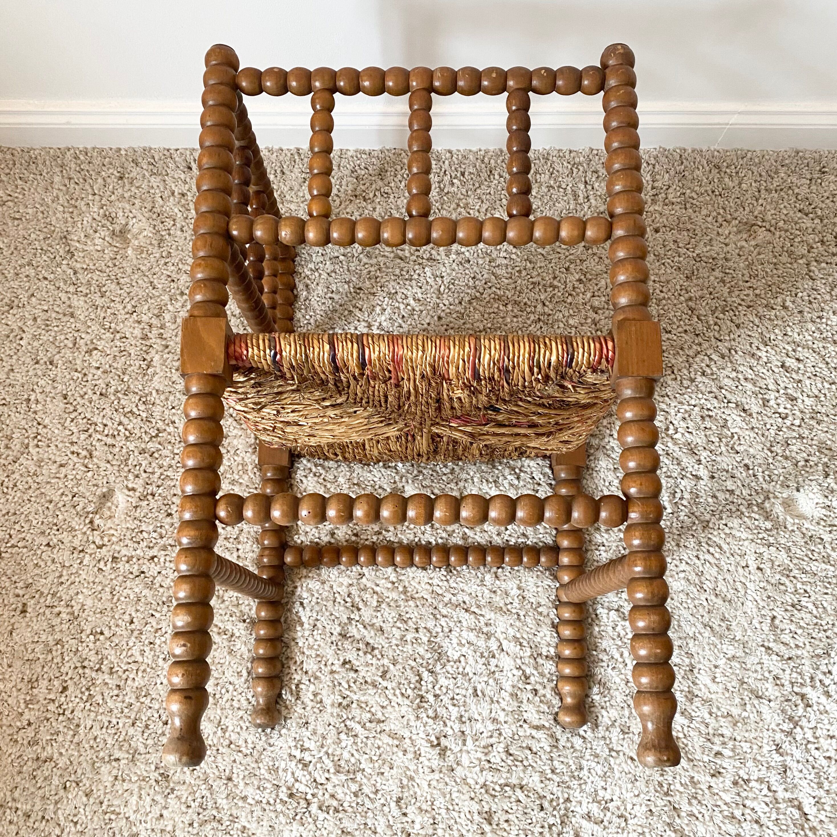Vintage corner chair in turned oak and straw