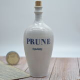 Vintage plum stoneware bottle