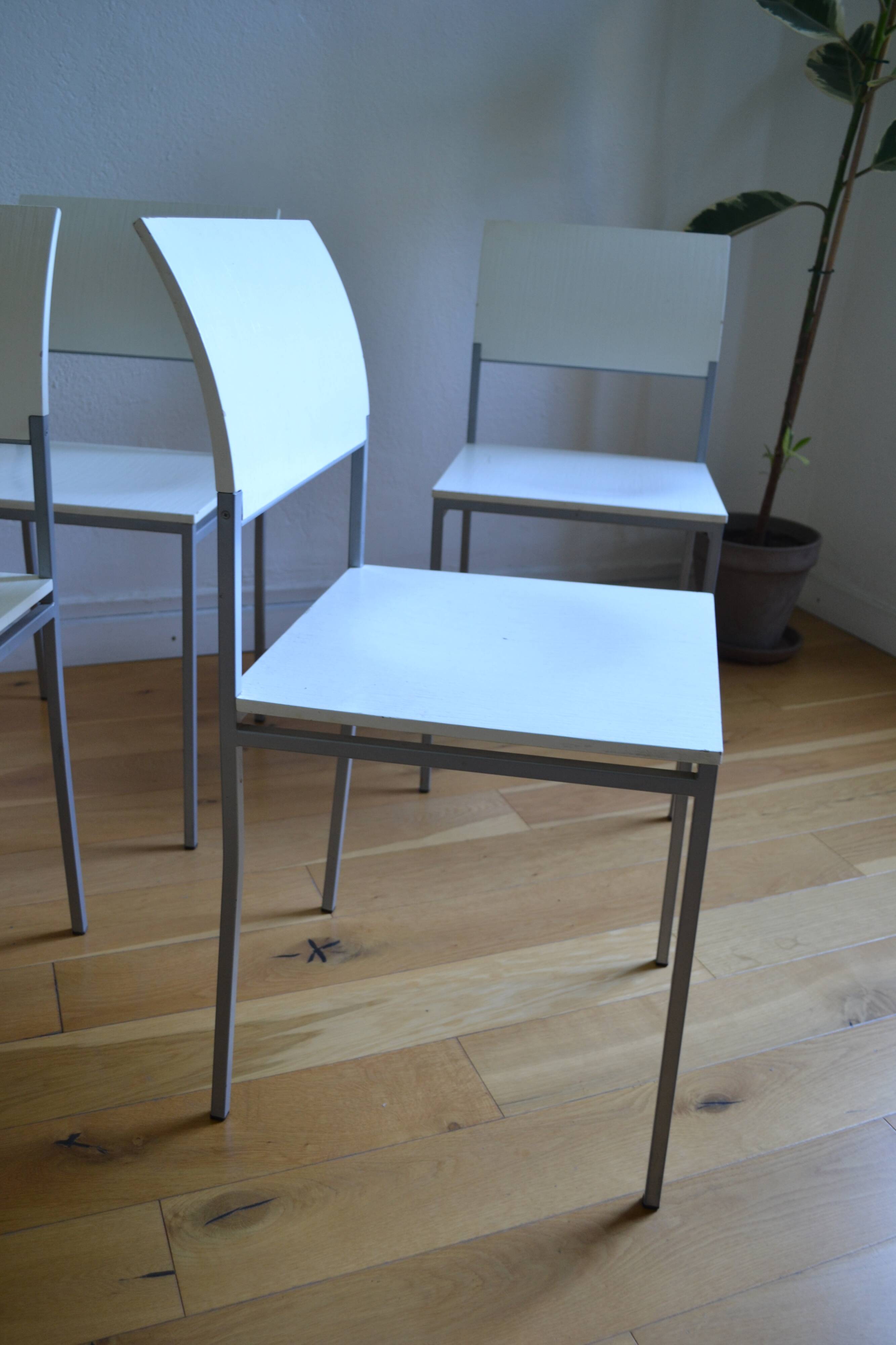 Set of 4 vintage metal and wood chairs from the 1990s.