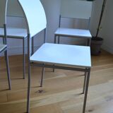 Set of 4 vintage metal and wood chairs from the 1990s.