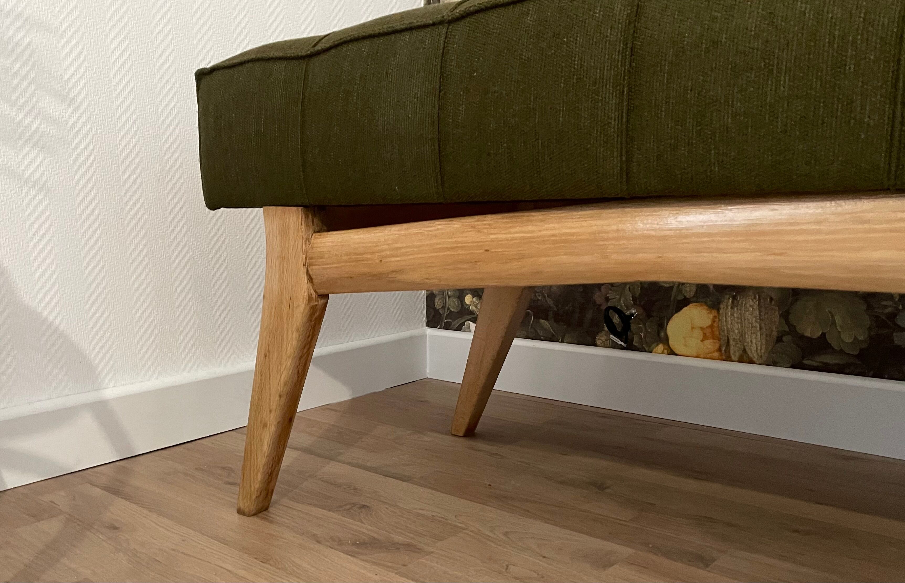 Wooden bench and green fabric