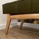 Wooden bench and green fabric