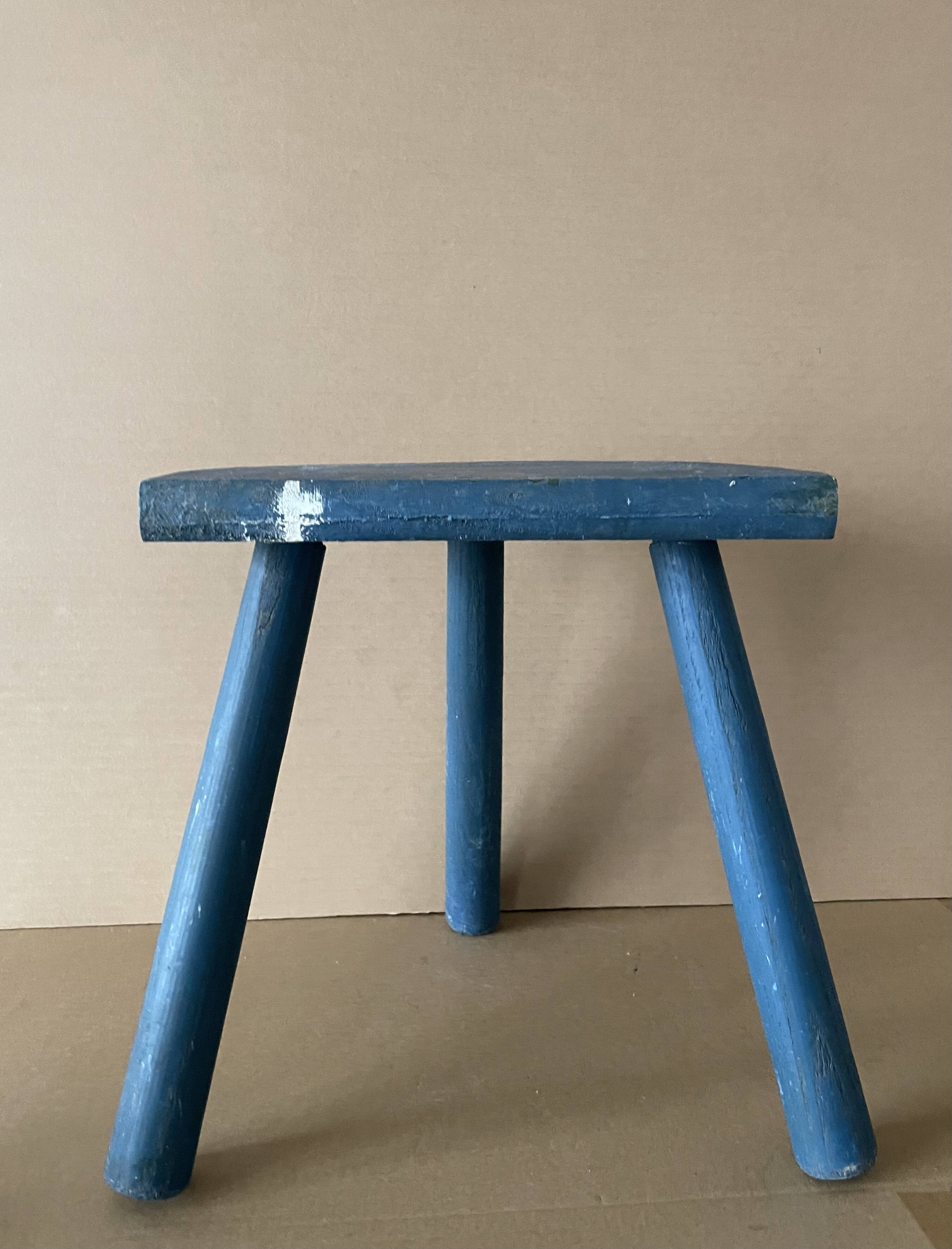 Wooden tripod stool