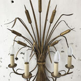 Gold metal reeds flowering wall light