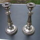 Pair of silver metal candle holders